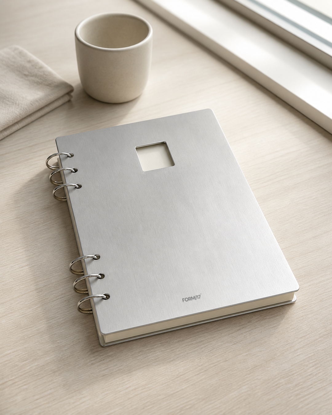 FORM/17 A5 Ring Planner on a light wood desk